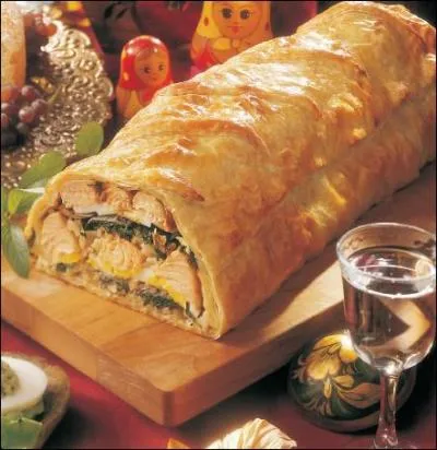 Voici un saumon en croûte, on dit qu'il est préparé :