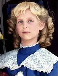 Après l'installation de Nellie à New York, quelle enfant est adoptée par la famille Oleson ?