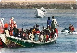 Comment dites-vous "immigrer" en anglais ?