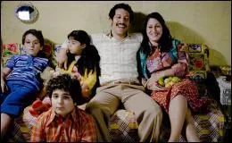 Qui raconte les souvenirs de la famille Yilmaz au petit-fils de Hüseyin ?