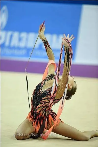 Son entraîneur se nomme :