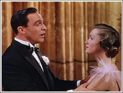 Quelle chanson est le titre d'un film avec Gene Kelly et Debbie Reynolds ?