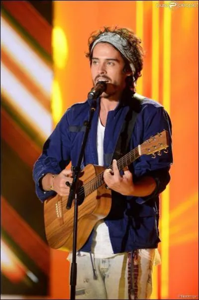 À quel âge Flo a-t-il commencé à jouer de la guitare ?