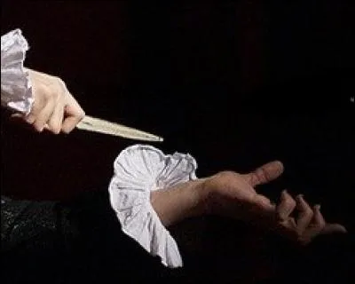 Dans quelle chanson le personnage brandit-il un couteau ?