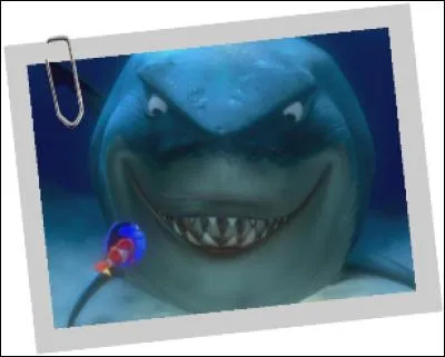 Comment se nomme le requin blanc que Nemo et Dory rencontrent dans "Le Monde de Nemo" ?