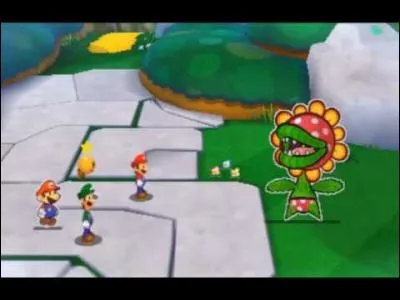 Quel est le bloc de commandes que vole Flora Piranha de papier aux frères Mario dès le début de leur combat ?