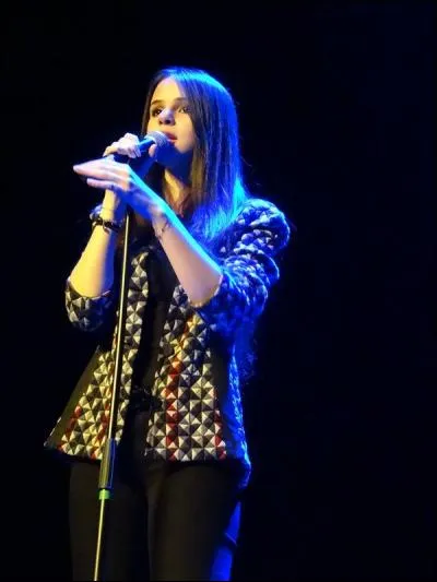 À quel âge a-t-elle enregistré ses premières chansons ?