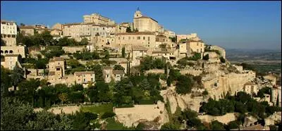 C'est un village de Provence, accroché à un rocher et dominé par son château.