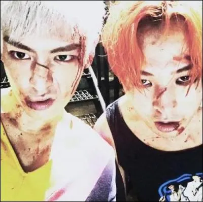 Dans le clip "Zutter" de T.O.P et G-Dragon, de quelle couleur sont les cheveux de G-Dragon ?