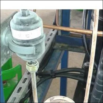 Sur cette installation, ce filtre est givré. Quelle peut être la cause de ce givrage ?