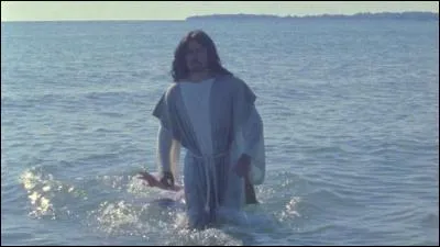 Qui le baptisa dans le fleuve Jourdain ?