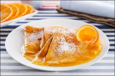 Quel prénom est associé à un dessert de crêpes au jus d'orange et Grand Marnier flambées ?