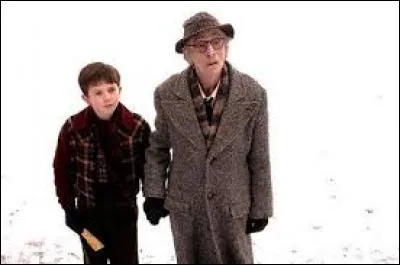 Quelle personne de la famille de Charlie travaillait dans la chocolaterie de Willy Wonka ?