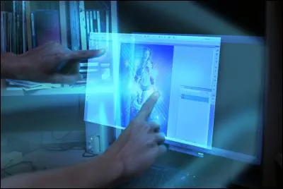 Un écran holographique tactile. Quelqu'un utilise ça dans la série, mais qui donc ?