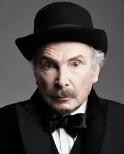 Quelle phrase Popeck dit-il souvent dans ses sketchs ?