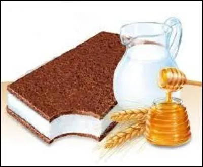 La photo nous montre un gâteau composé d'une crème de lait avec une touche de miel entouré d'une génoise au chocolat, il s'agit d'un...