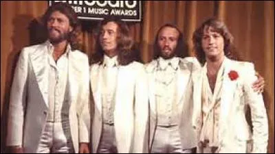 Quel métier le frère des membres du groupe, Andy, pratiqua-t-il ?