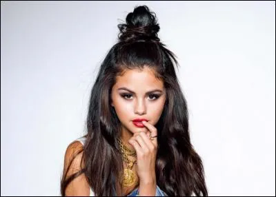 Quel rôle jouait-elle dans sa première comédie musicale "Barney" ?