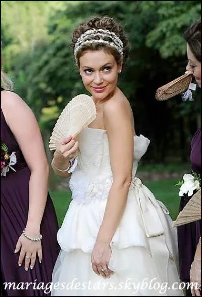 Qui épouse-t-elle en 2009, l'homme qui sera le père de ses fils ?