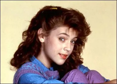 Dans quel sitcom des années 80 obtient-elle son premier rôle ?