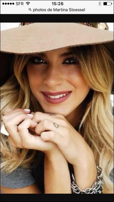 Que préfère-t-elle entre les films d'horreur et les comédies romantiques ?