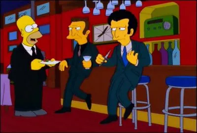 De quoi, Louie, le bras droit de Gros Tony ne se sépare-t-il jamais ?