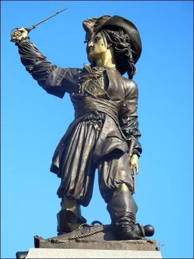 La cabine des WC, toujours à la dérive, avec à son bord De Funès et Galabru, approche d'un port et croise un navire. Ce navire porte le nom d'un corsaire dunkerquois oeuvrant sous Louis XIV. Qui est ce corsaire ?