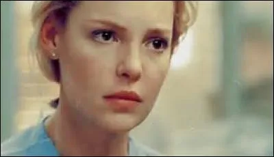 Qui Izzie voit-elle avant d'apprendre qu'elle a un cancer ?