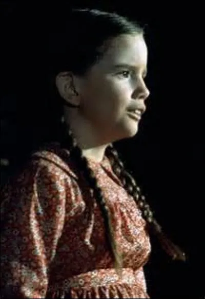 De quel garçon Laura parlait-elle sur la machine à musique achetée par les Oleson ?