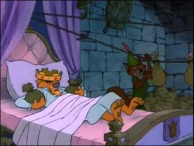 Dans cette scène de "Robin des bois", que se passe-t-il pour prince Jean alors qu'il dort ?