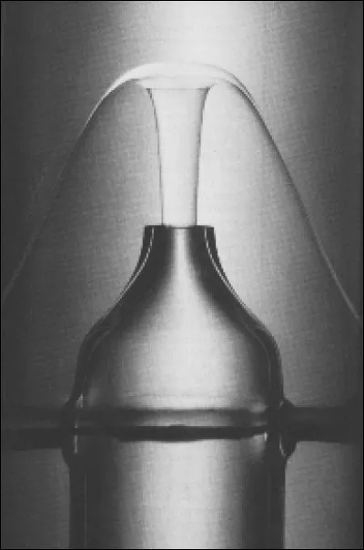 À quelle température l'Hélium devient un superfluide ?