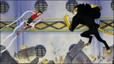 En version française, avec quelle technique Luffy terrasse-t-il son adversaire ?