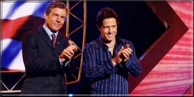 Dans ce film, Hugh Grant incarne un présentateur de télé-crochet aux dents longues qui invite le Président sur le plateau de son show. Il s'agit de :