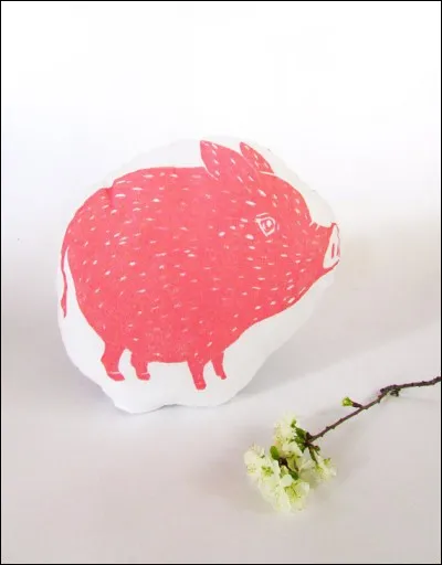 Où poserait-on ce coussin cochon ?