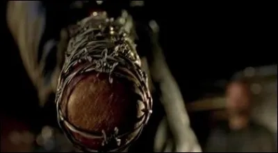 Quel est le premier indice qui annonce l'apparition de Negan dans la série télévisée ?