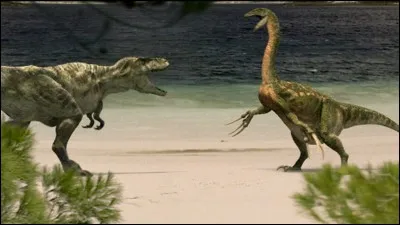 Un th&eacute;rizinosaure faisant face &agrave; un tarbosaure