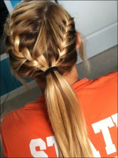 La meilleure coiffure pour aller courir un 100 M est une...